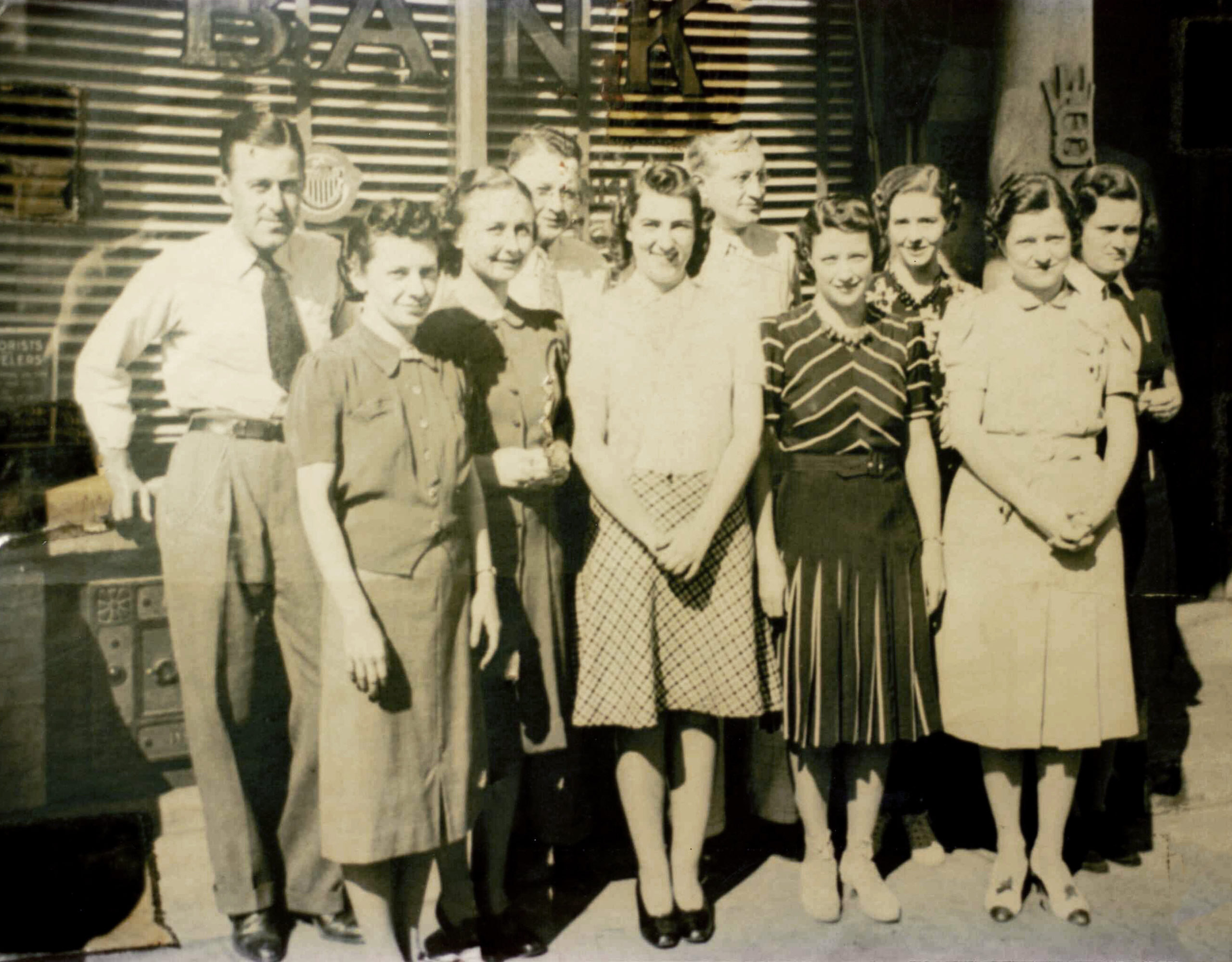 Staff outside of branch in the 1950s