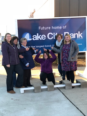 Akron team with Future Home of Lake City Bank sign